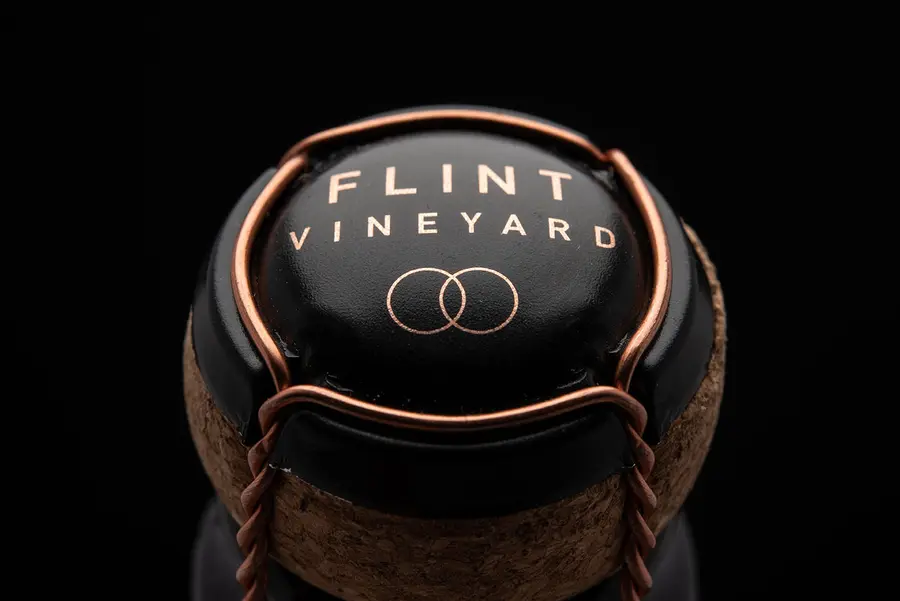 Flint Vineyard sparkling wine cork and wire cage with copper Flint branding
