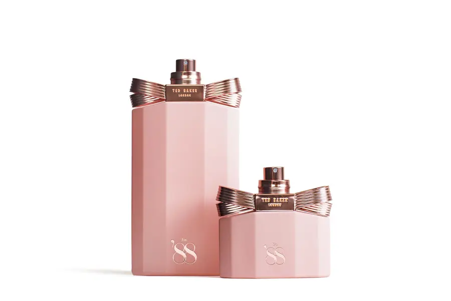 Ted Baker Est. ’88 fragrance bottles — architectural pink glass with rose-gold bow
